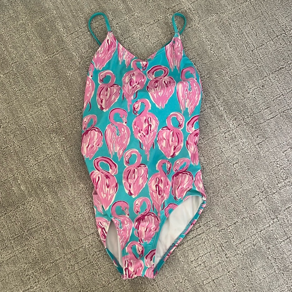 Pink flamingo girls bathing suit.